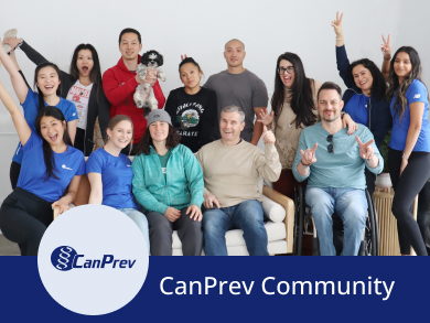 Group photo of CanPrev Community including a small dog, smiling with friendly hand gestures.